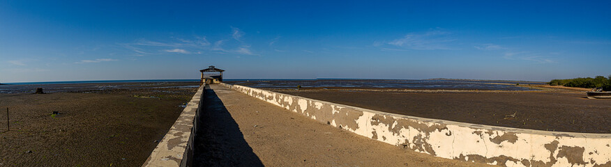 A small jetty in Koteshwar in the Kori Creek at low tide in the western most corner of India in Gujarat state