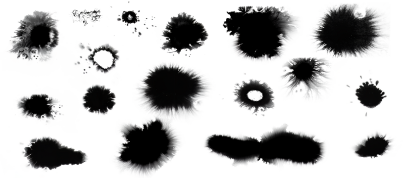 Collection of small and large black dried ink spots or inkblots