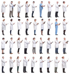 Obraz premium full length group of doctors with notepad isolated