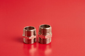 Double nipple with an external thread for connecting pipeline elements. Plumbing and heating.