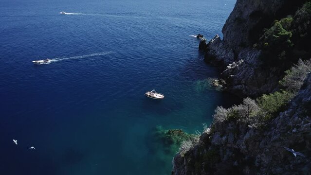 aerial view on boat in the bay on capri island