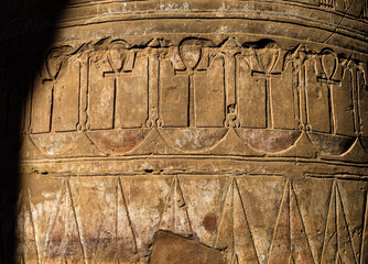 Stone pillar with Ankh symbols in Temple of Horus, Edfu, Egypt.