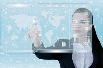 Young business lady works with virtual graphic interface in futuristic office