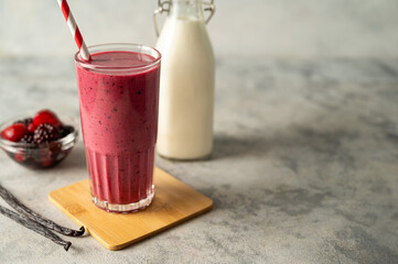 Berry smoothie drink with fresh fruits. Copy space for text.