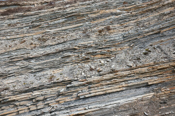 texture of rock with different rocks, several layers of rock, close-up