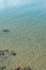 Top view to transparent clean blue sea still water. Costa Brava transparent Mediterranean sea