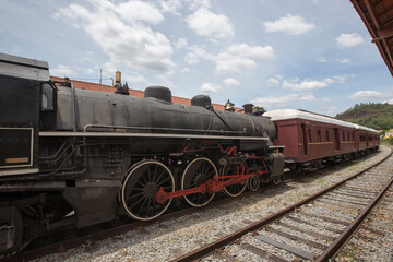 Fototapeta na wymiar Old steam train on a tourist walk. Guararema, Sao Paulo state, Brazil