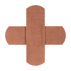 Close-up of fabric adhesive bandages in a cross isolated on white