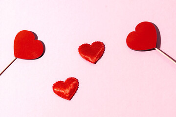 Happy Valentine's day. Red paper hearts isolated on pink background, paper art copy space for text. Copy space.