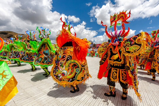 Dancers with typical devil costumes and other representations celebrate the festival of the Virgen de la Candelaria in Puno, Peru.