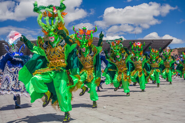 Dancers with typical devil costumes and other representations celebrate the festival of the Virgen de la Candelaria in Puno, Peru.