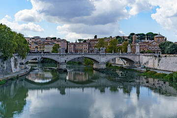 Fototapeta na wymiar The historic bridge of the Holy Angel over the river Tiber in Rome