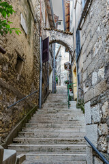 An old atmospheric city with narrow and cramped quiet streets and stairs