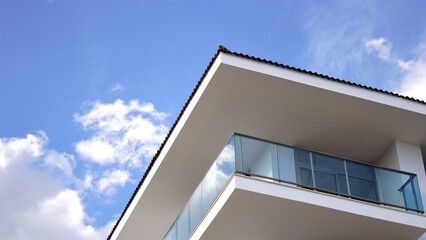 minimalist facade balcony against the sky