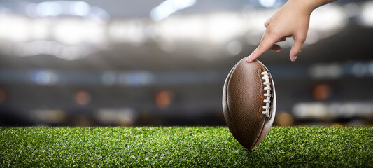 Player holding a soccer ball, to make a field goal - copyspace