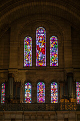 Stained glass windows at Sacre Coeur Cathedral in Paris, France