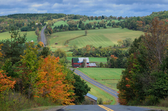 County Road 36 winding trough country landscape, near Portageville, New York, USA
