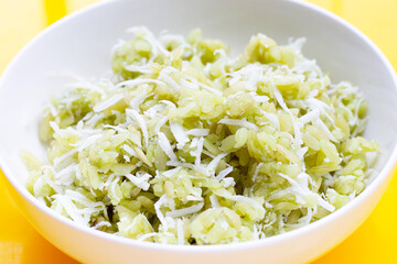 Green rice Thai dessert with coconut (Khao Mao)