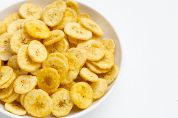 Banana slice chips on white background.
