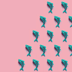 Skeletal fish background in pink and mint green colors, with copy-space, place for text. AI generative.