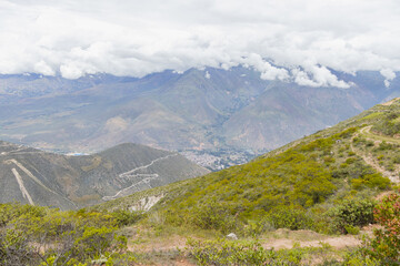 View of the horizon of the mountains of Caraz in the morning, surrounded by diverse vegetation and also view of the roads.