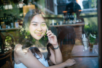 Business asian woamn use smartphone communication sitting in beautiful woman