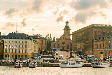 view of skyline of gamla stan by sunset in stockholm in summer