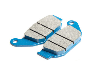 Motorcycle brake pads isolated on white background, close-up image