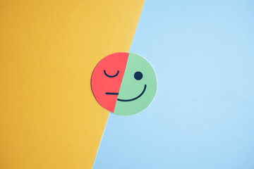 Happy smiley face hiding or behind sad face, change emotion bipolar and depression, mental health concept, personality, mood change, therapy healing split concept...