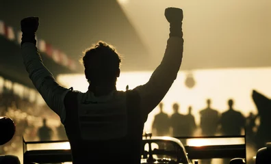 Poster Silhouette of race car driver celebrating the win, gran prix. digital art  © Viks_jin