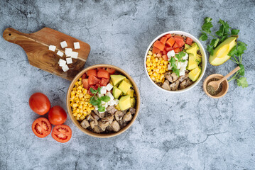 Fototapeta na wymiar Healthy salad in a bowl on a wooden table