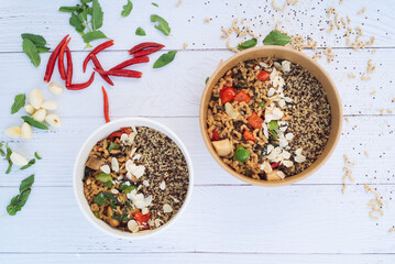 Krapao Thai Food with cereal quinoa healthy on wooden table