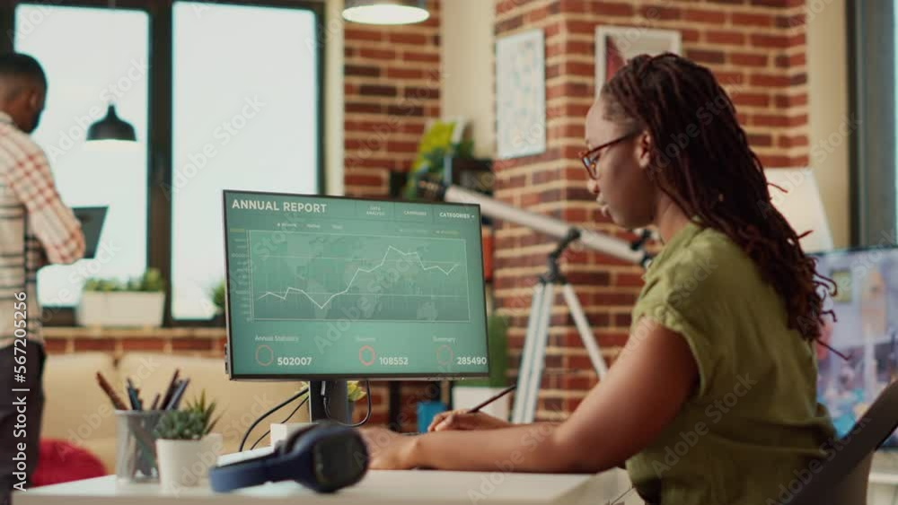 Poster female employee analyzing financial report on data diagrams, using online web statistics to find sal