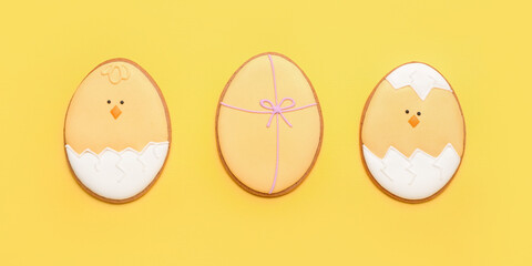Beautiful Easter cookies on yellow background