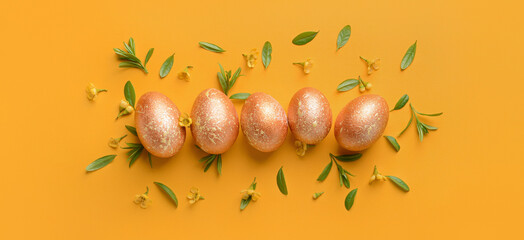 Beautiful Easter eggs on orange background