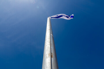 Israel flag on a pole