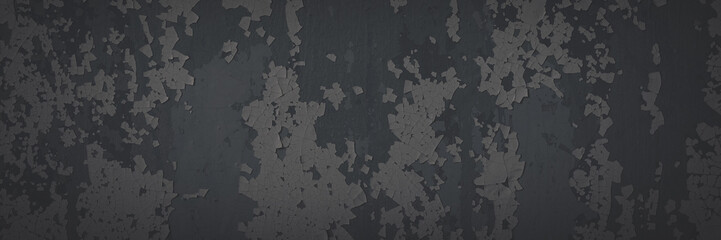 Dark wide panoramic background. Peeling paint on a concrete wall. Faded dark texture of old cracked flaking paint. Weathered rough painted surface with patterns of cracks. Shaded background for design