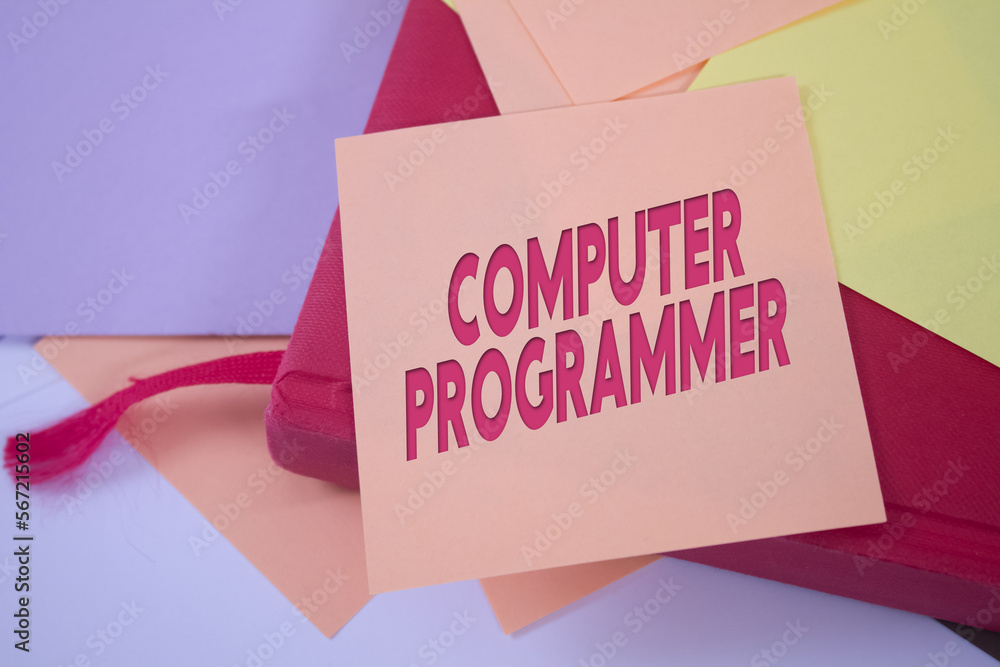 Poster computer programmer. text on adhesive note paper. event, celebration reminder message.