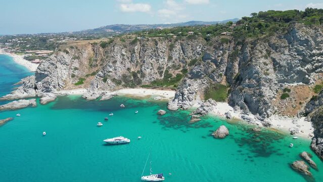 Capo Vaticano Beaches, Boats and Blue Mediterranean Sea in Calabria, South Italy - Aerial 4k
