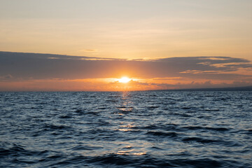 Dramatic sunrise over the sea at Bali Island. Copy space image.