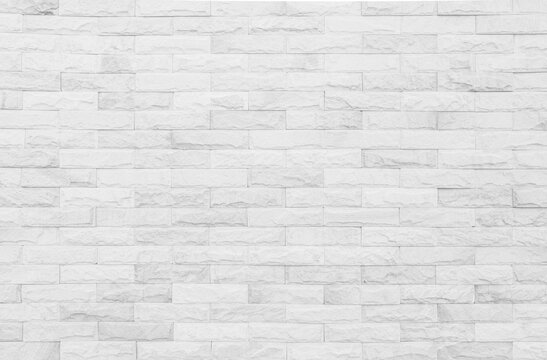 White grunge brick wall texture background for stone tile block painted in grey light color wallpaper modern interior design.
