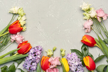 Composition with beautiful spring flowers on grunge background, closeup