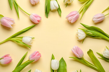 Frame made of beautiful tulip flowers on color background. Hello spring