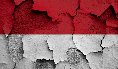 Flag of Monaco on old grunge wall in background
