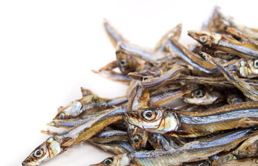 Pile of dried sardines for dogs and cats for treats. Many dehydrated fishes in multiple sizes....