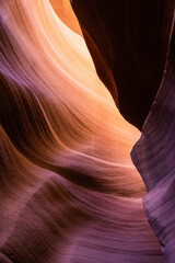 Details of the sandstone formations of Antelope canyon in Arizona with various hues of colors.