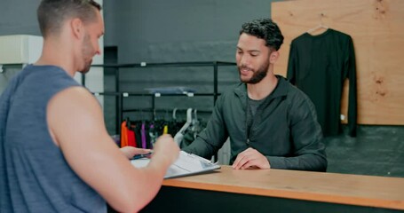 Handshake, discussion and men with a gym membership, welcome and signing paperwork for training. Networking, deal and man writing on a contract from a personal trainer and shaking hands fitness