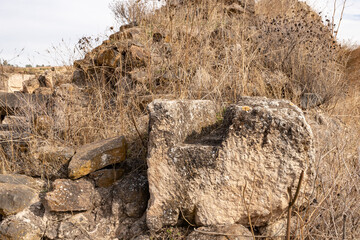 The ruins  of the fortress wall of the Ateret fortress - Metzad Ateret - Qasr Atara - located next to the ford of the Jacob daughters on the Jordan River, in northern Israel