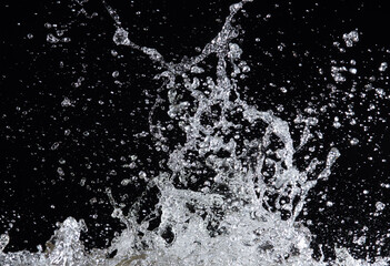 Water splash isolated on black background