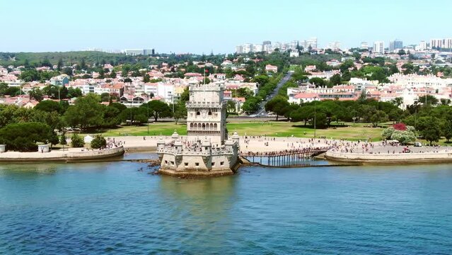 Drone Lisbon 4k. Belem Tower, Torre de Belem in historic capital of Portugal. Summer in Europe travel, famous tourism destination.